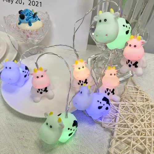 Vista 5 de Guirnalda de luces de vaca de Pascua de 5.4 pies, 10 luces LED de hadas de vaca de Navidad, funciona con pilas para decoración del hogar, fiesta