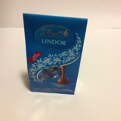 Vista 29 de Lindt Lindor - Trufas de chocolate extra oscuro 60 %, caramelo de chocolate negro con centro de trufa suave y derretida, ideal para regalar, 5.1