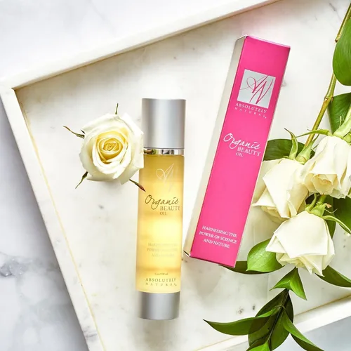 Vista 2 de Absolutely Natural - Aceite de belleza orgánico 4oz con vitamina E, aceites de oliva y escaramujos, fabricado en Estados Unidos