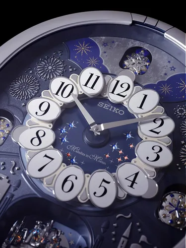Vista 7 de Seiko QXM379SRH 18 Melodies in Motion Rotating Pendulum Wall Clock, Silver