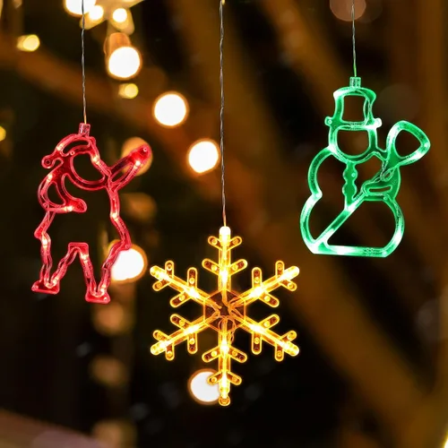 Vista 6 de Baquler 6 piezas de luces de ventana de Navidad con ventosa, luces colgantes para ventanas de Navidad que funcionan con pilas, Santa, reno, muñeco