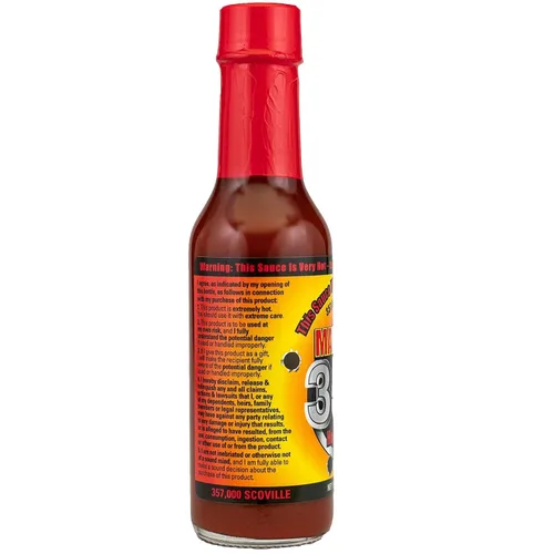 Vista 3 de Mad Dog 357 Salsa picante, hecha con 3 millones de extracto de pimienta Scoville, 357,000 Scoville, 5 onzas.