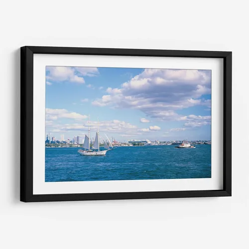 Canvas Lab | Sailboat leaving Manhattan by Raúl Ruz | 11 x 7 in | Fine Art Framed Print, Frame Color: Black, With Mat | Scenery, Beaches and seas,