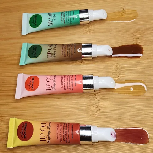 Vista 5 de Aceite labial hecho con semillas negras, semillas de uva y aceites de vitamina E Juicy By Mon Cheri (limonada de frambuesa) brillo curativo, todo
