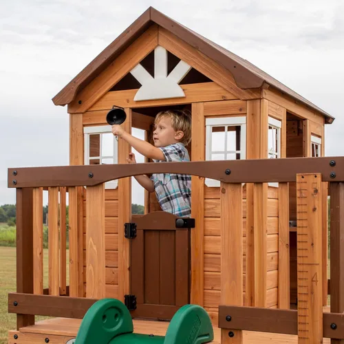 Vista 4 de Backyard Discovery Echo Heights - Casa de juegos elevada de madera de cedro para niños con tobogán ondulado, cocina de juegos, terraza envolvente