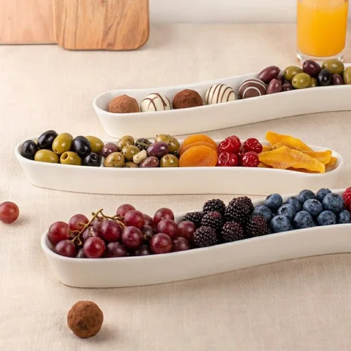 Vista 2 de Paquete de 3 platos para aceitunas - Bandeja de cerámica versátil para aperitivos, fuente de aperitivos - Vajilla larga en forma de arco tipo bote