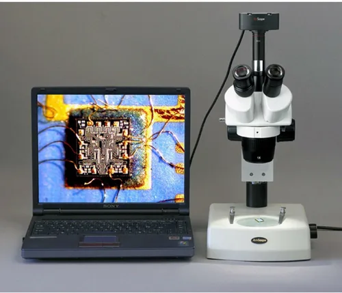 Vista 6 de AmScope Microscopio estéreo trinocular SW-2T13, oculares WH10x, aumento 10X y 30X, objetivo 1X/3X, iluminación halógena superior e inferior, soporte