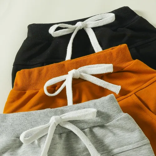 Vista 3 de Paquete de 3 pantalones deportivos de algodón con cintura elástica de color sólido para bebés y niños pequeños