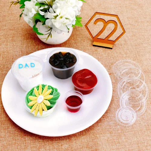 Vista 5 de TashiBox [200 juegos de 1 onza] Vasos de gelatina con tapas, vasos desechables de plástico con tapas, tazas pequeñas para soufflé, tazas