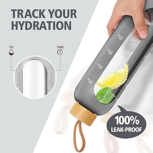 Vista 5 de Botellas de agua de vidrio de 32 onzas, botella de agua motivacional de vidrio con funda de silicona, popote y 2 tapas de bambú, vaso de admisión 1