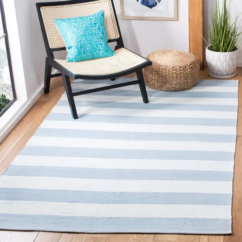 Vista 2 de Safavieh colección Montauk MTK712A, tapete de algodón tejido a mano color amarillo y marfil., Algodón