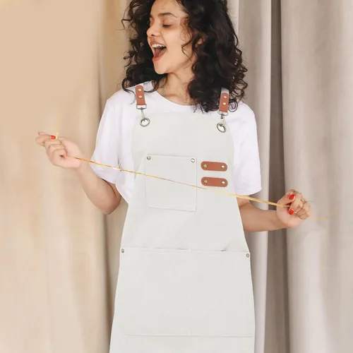 Vista 5 de Garneck Multi-pocket Kitchen Apron for Women Adjustable Waist Smock for Waitress and Cleaning Canvas Work Apron with Organized Pockets for Home and