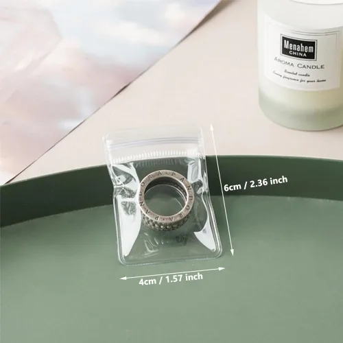 Vista 2 de Paquete de 100 bolsas de plástico transparente de PVC con cremallera antioxidación antidecoloración para embalaje de joyas, anillos, aretes, bolsa