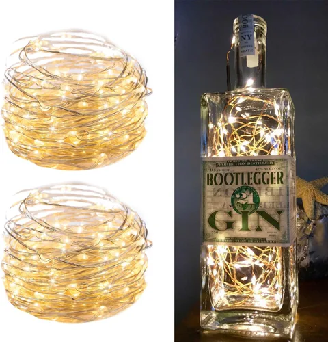 Vista 13 de Guirnaldas de luces enchufables, de 33 pies, 100 luces LED impermeables de alambre plateado, adaptador incluido, cable de luces estrelladas