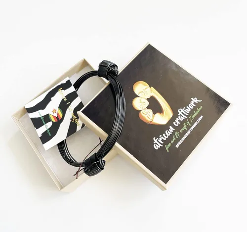 Vista 4 de Pulsera estilo nudo de elefante africano metal negro dos nudos Acero inoxidable