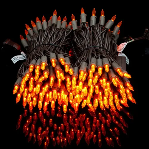 Vista 8 de YULETIME Juego de 200 luces LED de Navidad de color blanco cálido con cable negro, paquete de 2 hebras de 33 pies, 100 luces con certificación UL
