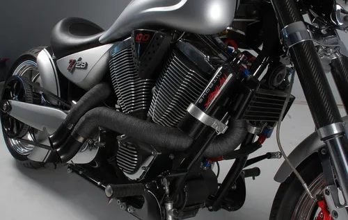 Vista 5 de Design Engineering - Cinta aislante para escape DEI 01010, rollo de 1" x 50' - color canela, Negro