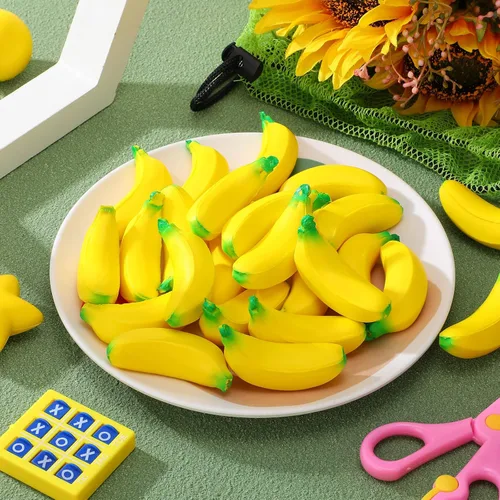 Vista 3 de Jerify 37 piezas de mini plátano juguetes para aliviar el estrés con bolsa de malla con cordón de poliuretano, juguete elástico para recuerdos
