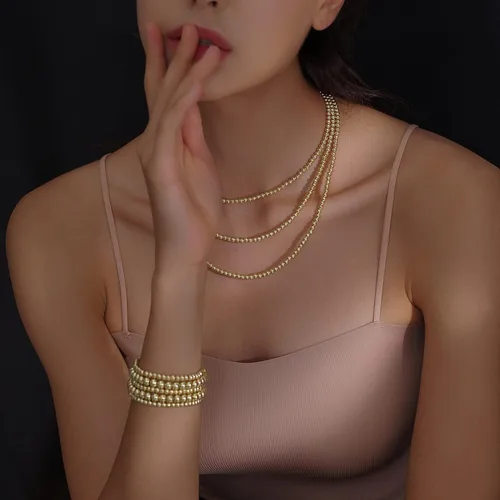 Vista 3 de Pulsera para mujer con cuentas chapadas en oro de 14 quilates, pulsera elástica de cuentas redondas