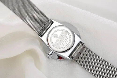 Vista 4 de MASTOP Reloj de pulsera con correa de malla tejida de acero inoxidable plateado para mujer, diseño simple analógico, reloj de cuarzo