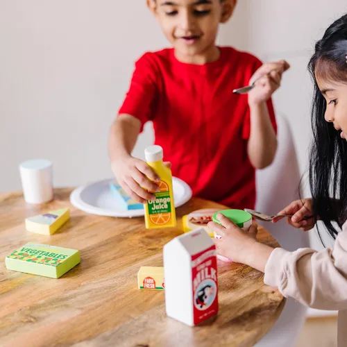 Vista 2 de Melissa & Doug, conjunto de alimentos de nevera, Anaranjado