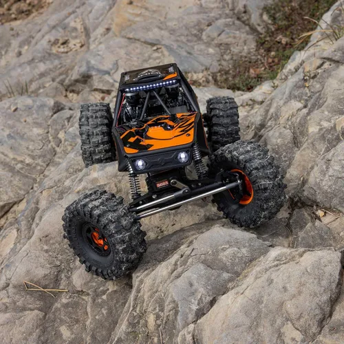 Vista 6 de Axial RC Crawler 1/10 UTB10 Capra 1.9 4WS 4X4 RTR Crawler de roca con cepillo, naranja, AXI-1543T1