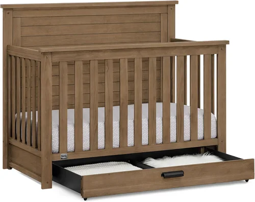 Vista 3 de Delta Children Simmons Kids Caden cuna convertible 6 en 1 con cajón de gaveta, certificada Greenguard Gold, roble envejecido