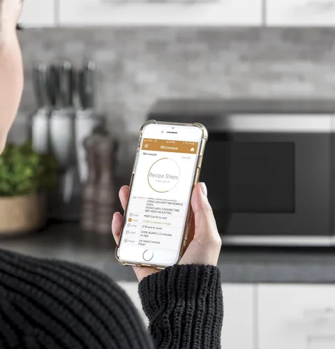 Vista 5 de [Usado] GE Horno microondas para encimera, compacto de 0.9 pies cúbicos, capacidad de 900 vatios, 7 ajustes de cocción automática, tecnología
