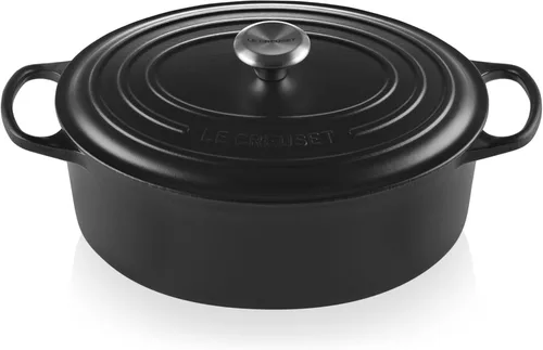 Vista 9 de Le Creuset Horno holandés ovalado Signature de hierro fundido esmaltado, 2.75 cuartos de galón., Blanco