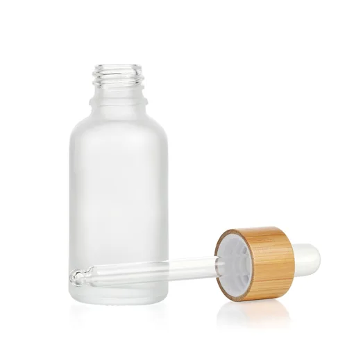 Vista 2 de 4 botellas de bambú con cuentagotas de vidrio esmerilado, botellas vacías de aceite esencial con pipetas de vidrio puro, tapa de bambú, maquillaje