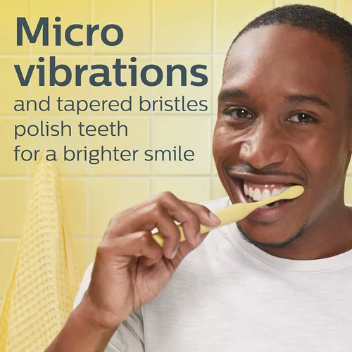 Vista 2 de Philips Sonicare Un cepillo de dientes eléctrico con estuche de viaje y 2 cabezales - Mango Yellow