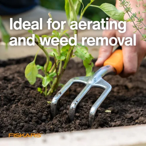 Vista 5 de Fiskars Ergo Cultivador para Cavar, Airear el Suelo y Deshierbar, Herramienta de Jardín de Alta Resistencia con Agujero para Colgar