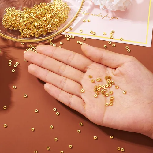 Vista 5 de Craftdady 500 cuentas espaciadoras redondas planas doradas de 0.157 pulgadas (0.157 in), diminutas cuentas de disco de moneda Rondelle